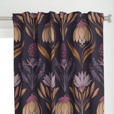 the curtain is hanging in front of a window with floral designs on it and purple background