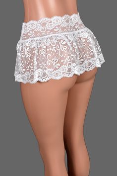 *Free USA shipping! *Handmade after you order: check order processing times This low-rise mini skirt is made out of sheer ruffled white stretch lace. ♦LENGTH: about 9 inches. All sizes are the same length. ♦FABRIC TYPE: Nylon/spandex lace ♦FEATURES: Both hem and waistband have scalloped edge ♦WASHING INSTRUCTIONS: hand wash cold or machine wash cold in a mesh garment bag, hang dry ■SIZE INFO: Find the size chart in the item images. Choose your size based on your waist measurement. This skirt is made out of stretch fabric with an elastic waist and the waistband is sized a little bigger than our other skirts so you can wear it lower around your waist. Size chart shows body measurements, not skirt measurements. The actual skirt waistband will be slightly smaller than your waist and stretch to Flirty Lace Mini Skirt, Flirty Lace Skirt With Lace Trim, Flirty Lace Trim Skirt, Sheer Lace Fitted Skirt, Fitted Lace Mini Skirt In Flirty Style, Fitted Lace Mini Skirt, Flirty Style, Flirty Fitted Lace Mini Skirt, White Scalloped Lace Skirt, Lace Ruffled Skirt Fitted