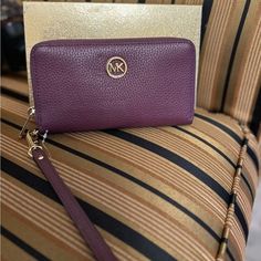 Brand New With Tags Attached. Plum Color Michael Kors Elegant Clutch Wallet, Elegant Michael Kors Clutch Wallet, Michael Kors Clutch Wallet With Card Slots, Michael Kors Wallets With Card Slots, Michael Kors Luxury Wallets For Everyday Use, Luxury Michael Kors Wallet For Everyday, Luxury Michael Kors Wallets For Everyday, Elegant Purple Leather Wallets, Michael Kors Clutch Wallet With Removable Pouch