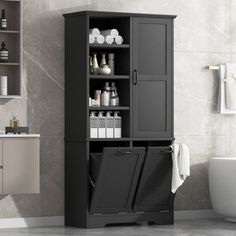 a bathroom with a black cabinet next to a toilet