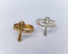 Join us in the Feather Tribe with this stunning Ankh Ring. The Ankh is an Ancient Egyptian symbol, also known as the Key of Life. It is the Egyptian hieroglyph for "life" or "breath of life" and, as the Egyptians believed that one's earthly journey was only part of an eternal life, the ankh symbolizes both mortal existence and the afterlife.✿»☤♕☤«✿ Size & Material ✿»☤♕☤«✿ 1.5 cm x 0.8 cmRing size: AdjustableBrass / Silver Dipped Rings Spiritual, Spiritual Rings, Ankh Ring, Egyptian Ring, Ancient Egyptian Hieroglyphics, Ancient Egyptian Symbols, The Ankh, Key Of Life, Bird Rings