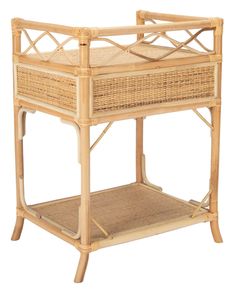 a bamboo and wicker baby crib is shown