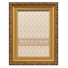 a gold frame with an ornate pattern on it