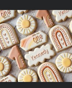 decorated cookies with different designs and words on them