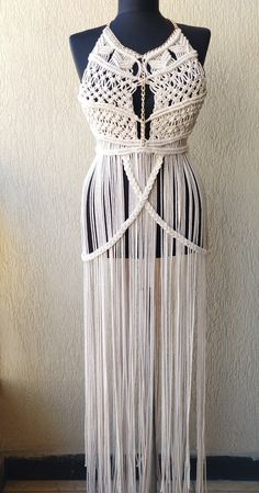 "This macrame dress is made of cotton in White color. You can wear this beautiful hand made dress as a beach wear, festival dress, etc. This boho dress is S-M size Model dimensions: Bust 31\", Waist 24\", Hip 35\"     NOTE: The dress could be only hand washed, just steam ironing. All our items are made to measure, and handmade.  We want to ensure a perfect fit of your individually customized garment, so once you place your order please send us a message with your measurements. (Waist circumferen Bohemian Crochet Dress With Tassels For Summer, Bohemian Crochet Tassel Dress For Summer, Bohemian Summer Crochet Dress With Tassels, Summer Bohemian Crochet Dress With Tassels, Festival White Handmade Dress, Bohemian Cotton Party Dress, Beige Tassel Dress For Festival, Festival Beige Dresses With Tassels, Beige Festival Dress With Tassels