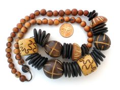 Chunky Wood Bead Necklace Hand Carved Vintage - The Jewelry Lady's Store Unique Brown Fair Trade Necklace, Unique Carved Brown Necklace, Unique Brown Carved Necklace, Brown Carved Round Bead Necklaces, Vintage Brown Wooden Bead Necklaces, Brown Carved Round Beads Necklaces, Unique Brown Necklace With Large Beads, Brown Necklace With Large Beads, Vintage Brown Beaded Necklace With Wooden Beads