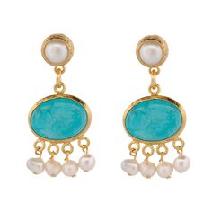 Cleopatra Pearl & Turquoise Stone Tassel Earrings are a majestic fusion of elegance and striking beauty. The earrings are expertly crafted from brass and feature a luxurious 24k gold plating that adds a radiant warmth to the design.  Each earring showcases a harmonious blend of delicate pearls and vibrant turquoise stones, arranged to create an eye-catching tassel effect. The pearls provide a touch of classic refinement, while the bold turquoise stones inject a pop of color and exotic charm.  Th Striking Beauty, July Birthstone Jewelry, June Birthstone Jewelry, August Birthstone Jewelry, White Turquoise, Pearl Jewellery Earrings, Jewelry Ring Box, Turquoise Stones, Pearl Gemstone