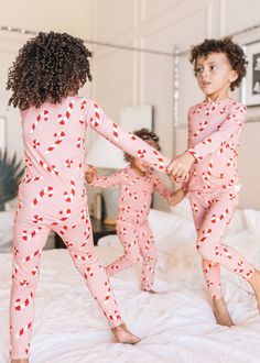 Do you love to cozy up with your little ones in the evening? Then you will fall head over heels for these super soft pajamas. With a variety of different prints, your cute babies will be ready for bed before they even know it! Content + Care 95% Bamboo, 5% Spandex Machine wash cold Questions about fit and sizing? Email us at hello@loocsy.com Christmas Pajamas Photoshoot, Baby Christmas Pajamas, Pink Candy Cane, Grinch Pajamas, Pink Pjs, Pajamas For Kids, Christmas Pajamas Kids, Be Silly, Sister Christmas