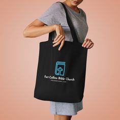 The cotton canvas tote bag is the ideal grab & go accessory. Made of 100% cotton, it features long, reinforced shoulder straps for exceptional comfort. This customizable, 42cm x 42cm tote fits right in with any style.  .: 100% cotton canvas .: Medium-heavy fabric (9.44 oz/yd² (320 g/m .: Reinforced shoulder straps .: One size Cotton Tote Bag With Adjustable Strap, Cotton Canvas Tote Bag With Adjustable Strap, Black Cotton Canvas Bag With Reinforced Handles, Black Cotton Shoulder Bag With Reinforced Handles, Cotton Tote Shoulder Bag With Reinforced Handles, Black Cotton Canvas Bag With Adjustable Strap, Everyday Cotton Canvas Bag With Branding, Cotton Tote Bag With Branding, Casual Canvas Tote Bag With Branding