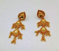 22karat yellow gold handmade tribal designer stud earrings. lab tested 916/22k hallmarking.Weight-8.400 grams approx.Metal-22 k yellow gold .length-5 cm approx.brand-handmade.condition-excellent condition,brand new.for more information please see the photo'sgold jewelry is handmade designer jewelry. so, there can be slight difference in size and weight of the article in the comparison of the description. Heavy 22k Gold Earrings For Puja, Gold Dual-tone Temple Jewelry Earrings, 22k Gold Earrings For Puja, Traditional Heavy Gold Earrings, Dual-tone Gold Drop Earrings, 22k Gold Bollywood Earrings For Puja, Traditional Heavy 22k Gold Earrings, Heavy Yellow Gold Temple Jewelry Earrings, Traditional 22k Gold Danglers For Diwali