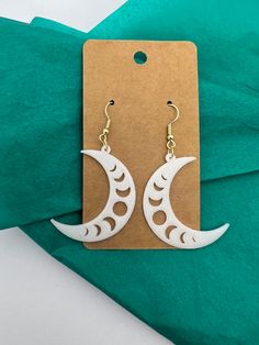 3D printed crescent moon earrings with silver plated backings.  Stylish and Sustainable: Biodegradable Earrings Because these are 3D Printed they can display layer lines, which is part of the printing process. If you have questions, please feel free to contact me! White Moon-shaped Earrings As Gift, Moon-shaped White Earrings For Gift, White Moon-shaped Earrings For Gifts, White Crescent Earrings As Gift, White Crescent Earrings For Gift, White Crescent Earrings For A Gift, White Round Moon Phase Earrings, White Moon-shaped Earrings For Pierced Ears, 3d Printed Earrings Design