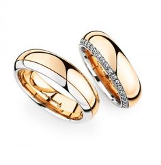 two wedding bands with diamonds on them