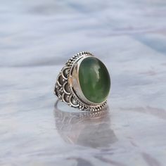 NOTE : WE USED NATURAL GEMSTONES , SO STONE MAY BE LITTLE DIFFERENT .This is a listing of Boho sterling silver ring # metal = sterling silver 925 # Gemstone - Green Jade # Ring Size - Available in all Size # Stone Color - Green # Stone Shape - Oval Handmade Crafting bohemian Ring - This style has bohemian style . it will look beautiful when you wear it .. Thanks for visiting our shop ... favorite our shop for daily updates ... Bohemian Oval Cabochon Ring, Adjustable Green Bohemian Emerald Ring, Adjustable Green Emerald Bohemian Ring, Adjustable Bohemian Green Emerald Ring, Bohemian Cabochon Ring Jewelry, Adjustable Oval Bohemian Rings, Bohemian Cabochon Ring, Bohemian Style Round Emerald Ring, Bohemian Round Emerald Ring