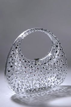 Elevate your style with this Diamond Glass Handbag 鈥 a captivating accessory that adds a touch of glamour to your ensemble. Crafted with meticulous detail and adorned with sparkling diamonds, this handbag is the perfect choice to enhance your charm at upscale events, cocktail parties, and fashionable gatherings. Formal Crystal Handheld Bag, Formal Handheld Crystal Bag, Crystal Handheld Bags For Events, Party Shoulder Bag With Rhinestones And Crystal Material, Sparkling Crystal Bags For Party, Embellished Top Handle Evening Bag For Party, Modern Party Shoulder Bag With Detachable Handle, Embellished Top Handle Shoulder Bag For Parties, Rectangular Crystal Party Bag