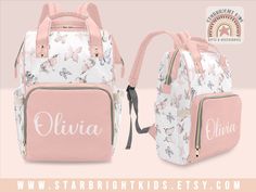 two pink and white backpacks with butterflies on them, one has the name eliia