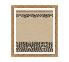 a beige area rug with black and white designs on the border, in a wooden frame