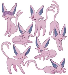 some pink and blue cartoon cats with long ears on their heads, all in different positions