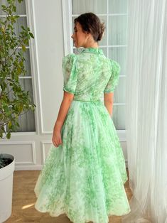 Summer Short Sleeve Tulle Dresses, Spring Green Organza Dress, Green Organza Dress For Spring, Fitted Tulle Dress With Short Sleeves, Short Sleeve Dress With Fitted Bodice For Garden Party, Green Organza Dress For Garden Party, Garden Party Dress With Fitted Bodice And Short Sleeves, Feminine Short Sleeve Prom Dresses, Green Organza Summer Dress