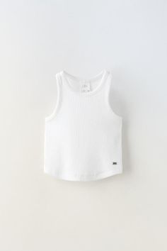 RIB RACERBACK TOP - White | ZARA United States Sporty Scoop Neck Summer Top, Zara Sporty Cotton Top, Sporty Scoop Neck Top For Spring, Trendy Racerback Vest For Spring, Chic Racerback Tops For Spring, Basic Crew Neck Tank Top For Summer, Chic White Racerback Tank Top, Zara Summer Tank Top, White Racerback Trendy Tops