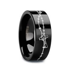 a black ring with white crosses on it