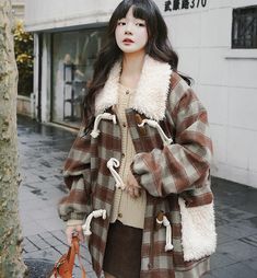 This Women's Horn Button Coat is a must-have for the winter season. Made from a blend of wool and polyester, this coat features a stylish brown plaid pattern that adds a touch of sophistication to your look. The large lapel collar and thick, loose fit ensure both warmth and comfort. Main Features: Made of woolen and polyester fabric Brown plaid pattern for a chic look Oversized coat for easy layering Perfect for streetwear Keeps you warm during the winter months Product Details: Shoulder width: Winter Coat For Women, Plaid Wool Coat, Streetwear Coat, European Shoes, Wool Winter Coat, Coat For Women, Wool Winter, Oversized Coat, Night On The Town