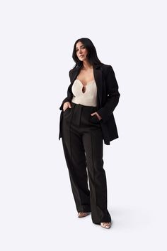 A modern, tailored blazer designed to be worn on repeat throughout seasons. Cut in a longline style, designed to elongate the torso and accentuate your natural silhouette. Style Notes: Pair with a singlet and denim, or with our Isobel Pant for a statement look. *LIMITED SIZES REMAINING Black Tailored Blazer With Concealed Placket, Tailored Black Satin Blazer, Tailored Single-button Leather Blazer, Black Structured Single Button Blazer, Black Structured Single-button Blazer, Blazer Designs, Tailored Blazer, On Repeat, Long A Line