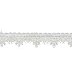 a white lace trim with flowers on it