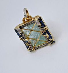 This is an 18k gold pendant made by Robert Wander a well known fine jewelry artist from France 18k gold 24.7 grams (total with stones) 30 blue sapphires 34 chocolate diamonds 14 white diamonds The aquamarine is approximately 30-40 ct based on measurement 24x22mm Stamped Rw with serial number The only one for sale that I can find this would complete the set you see on the last picture! Happy bidding :) Crystal Candy, Candy Collection, Chocolate Diamonds, Jewelry Artist, Fine Jewellery Necklace, Artistic Jewelry, A Well, White Diamonds, Diamond White