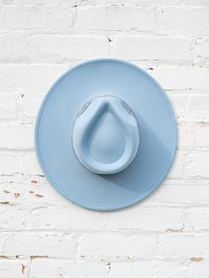 This wide-brim hat is perfect for beautiful spring clouds and sunny days. The patterned band is just the right amount of detail. Add this baby blue hat to a simple outfit for a boho chic style. SIZE & FIT One size fits most The adjustable string inside can be tightened Blue Flat Brim Hat, Blue Fedora Hat Outfit, Wide Brim Hat Outfit, Baby Blue Hat, Fedora Hat Outfits, 2025 Wishlist, Country Vibe, Spring Hat, Fashion 23