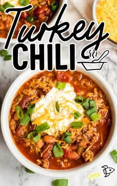 a bowl of turkey chili with sour cream on top