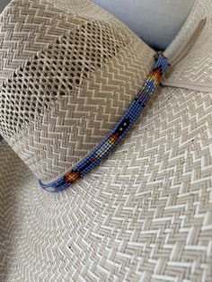 "1/4\" wide All bead work is beaded with 10lb extreme braided nylon line. All hat bands are finished at 23\" with glued than sewed down leather ends and an adjustable leather tie." Adjustable Blue Southwestern Hat Band, Adjustable Southwestern Blue Hat Band, Southwestern Blue Beaded Hat Band, Adjustable Woven Hat With Flat Crown, Adjustable Blue Woven Hats, Adjustable Woven Blue Hats, Western Woven Hat Bands For Festivals, Blue Adjustable Woven Hats, Blue Beaded Hat Bands For Festival