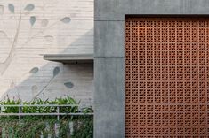 the side of a building with a decorative wooden door