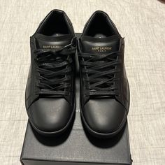 Excellent Condition Classic Black Sneakers With Leather Sole, Black Business Sneakers With Leather Sole, Black Leather Sole Sneakers For Business, Formal Black Lace-up Sneakers, Luxury Black Plain Toe Sneakers, Black Plain Toe Sneakers With Leather Sole, Masculine Black Low-top Sneakers, Luxury Streetwear Sneakers, Designer Low-top Sneakers For Business