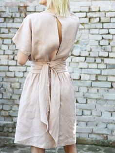 Linen dress with a wide and long tie at the waist. Midi, light dress with an open back. DETAILS: - 100% light linen, washed, softened - Includes one linen dress  - Rose colour on the pictures - Adjusting the waist with a wide (15cm), long (230cm) tie, sewn in at the back of the dress - Wide, short  sleeves. - V neckline - Knee length - French seams - Shrinkage after the first wash up to 3% SIZES: Size S- the length- 100cm, Waist circumference 90 cm, bust length ±92cm Size M- the length- 100cm, W Beige V-neck Dress With Tie Back, Summer Short Sleeve V-neck Dress With Tie Waist, Chic Short Sleeve Maxi Dress With Tie Waist, Elegant V-neck Backless Dress For Casual Occasions, Elegant V-neck Backless Dress For Casual Events, Chic Surplice Neckline Dress With Tie Back, Short Sleeve Beach Dress With Tie Back, Short Sleeve Tie Back Beach Dresses, Elegant Tie Waist Backless Dress