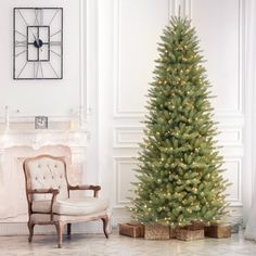 Get into the holiday spirit with this slender artificial Fir Christmas tree, pre-lit with warm lights for a cozy ambiance. Its hinged branch construction and PVC tips make setup a breeze, while the included metal stand ensures stability. The tree's slender shape is perfect for smaller spaces, bringing festive cheer to every corner of your home. Plus, the stay-lit bulbs keep shining even if one goes out. So, gather around with family and friends, and let the tree-lighting festivities begin! Kelly 5’ Christmas Tree, Best Chrisymas Tree, 12’ Christmas Tree, 4’ Christmas Tree, Best Christmas Trees Artificial, Slim Christmas Trees, Green. Hristmas Tree, 6 Ft Prelit Christmas Tree, Minimalsit Christmas Tree