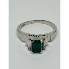 Diamond .64 Emerald Diamond Platinum Engagement Cocktail Ring 7.5. Dover Jewelry Presents The Following Item, Please Read The Information Below Carefully: Estate Diamond Emerald Platinum Ring Metal Type: Platinum Total Item Weight Approx: 6 Grams Top Measures Approx: 7.5x6.5mm (Diamond And Emerald Part) Ring Size Approx: 7.5 Sizable) 1. Gemstone: Genuine Diamond Number Of Stones: 2 Carat Total Weight Approx: 0.12 Cttw Stone Shape: Baguette Cut Color Grade Approx: H-I Clarity Grade Approx: Si1 Setting: Channel Set 2. Gemstone: Genuine Emerald (With Natural Inclusions) Number Of Stones: 1 Carat Total Weight Approx: .52 Cttw Stone Shape: Rectangular Emerald Cut Setting: Prong Set Classic Silver Emerald Ring Gia Certified, Classic Silver Gia Certified Emerald Ring, Classic Round Cut Emerald Ring In Platinum, Classic Platinum Emerald Ring With Round Cut, Classic Emerald Ring With Brilliant Cut For Formal Occasions, Classic Emerald Ring With Brilliant Cut For Formal Events, Classic Round Cut Emerald Ring For Formal Occasions, Formal Emerald Ring With Channel Set Round Cut, Classic Platinum Emerald Ring With Center Stone