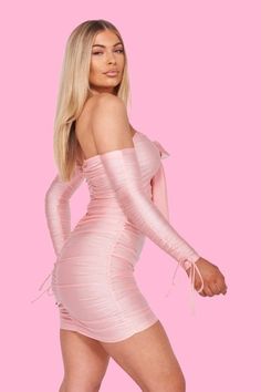 Hey beaut, give your look a fierce feminine touch with this slinky pink satin bardot mini bodycon dress. Featuring a cut out and ruched detail you’ll look like a star from any angle. Style this dress with some strappy heels and clutch for the ultimate weekend party look. Material: 95% Polyester 5% Elastane Product care: See care label Product Info Length: approx 88cm Model wears size UK 8/ EU 36/ AUS 8/ US 4 Model Height - 5ft 7" Refunds For UK orders: we have a 14-day return policy, which means