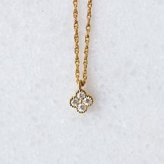 Elegant Teardrop Pendant Necklace With Charms, Elegant Gold Plated Flower Charm Necklace, Elegant Gold Plated Necklace With Flower Charm, Formal Gold Plated Flower Pendant Jewelry, Fine Jewelry Gold Square Pendant, Gold Fine Jewelry With Square Pendant, Gold Square Pendant Fine Jewelry, Gold Oval Pendant Jewelry With Charms, Gold Plated Oval Pendant Necklace With Charms