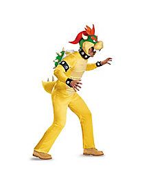 a man in a yellow costume is dancing