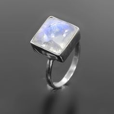 Genuine Rainbow Moonstone Ring - 925 Sterling Silver Ring - Moonstone Ring - Handmade Ring - Wedding Band - Stackable Ring - Birthday Gift 》D E T A I L S《  ✦Gemstone : Rainbow Moonstone ✦Metal : 925 Sterling Silver ✦Gemstone Size : 12 x 12 MM Approx ✦Weight : 4.75 Gram Approx ❣❣ Handmade Item ❣❣ **This ring is Made to Order** 》G EM S T O N E  D E T A I L《 **Gemstone structure may vary from the image as two gemstones do not have the same structure.** If you want to see the picture of gemstone, th Silver Moonstone Ring For Formal Occasions, Handmade Sterling Silver Moonstone Ring For Formal Occasions, Anniversary Silver Moonstone Ring With Stone Setting, Moonstone Rings With Stone Setting As Gift, Moonstone Ring With Stone Setting As Gift, Handmade Silver Moonstone Ring For Wedding, Unique Sterling Silver Moonstone Ring With Bezel Setting, Unique Moonstone Ring In Sterling Silver With Bezel Setting, Silver Sterling Moonstone Wedding Ring