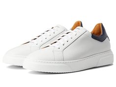 Magnanni Castillo - Men's Lace up casual Shoes : White/Navy : For all Magnanni footwear, the brand suggests sizing down a half size for the best fit. Turn heads in style with the unique design of the Magnanni Castillo. Premium leather upper with woven design at toe. Lace up front with blind eyelets. Soft leather lining and insole. Durable leather outsole with stacked heel. Made in Spain. Measurements: Heel Height: 1 in Weight: 1 lb 3 oz Product measurements were taken using size 12, width M. Ple Elegant Suede Sneakers With Leather Sole, Formal Low-top Sneakers With Suede Lining, Luxury White Suede Sneakers, White Luxury Suede Sneakers, Elegant Suede Sneakers With Plain Toe, Elegant Plain Toe Suede Sneakers, Elegant Suede Sneakers, Formal Suede Sneakers With Rubber Sole, Classic Suede Sneakers With Removable Insole