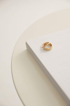 METAL14kt Yellow Gold1.2mm textured band STONE1.2mm Round White DiamondsApprox. .024TCW Stone Diamond Ring, Three Stone Diamond Ring, Three Stone Diamond, Gold Band, Three Stone, Yellow Gold Rings, Bezel Setting, Gold Bands, Diamond White