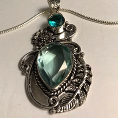 Stunning 925 Sterling Silver Aquamarine Aqua Apatite Necklace. 20 Inches N Chain Length. 2.5 Inches N Pendant Length. 30 Carats Of Aquamarine Stones. 2 Carats Of Aqua Apatite Stones. 100% Authentic Stones, 925 Sterling Silver. This Will Be A Nice Addition To Your Jewelry Collection. Thanks For Dropping In An Checking My Closet Out. God Has Blessed Me With Such Wonderful People In My Life. I’m So Appreciate Everyone Of You. “Hugs” May Gods Light Shine Upon All Of You. Silver Green Amethyst Gemstones For Gift, Silver Jewelry With Gemstone Accents For May Birthstone, Silver Jewelry With Green Amethyst For Gift, Handmade Silver Jewelry With Green Amethyst, Ring Design Ideas, Ruby Diamond Necklace, Apatite Necklace, Aquamarine Necklace, Halo Pendant