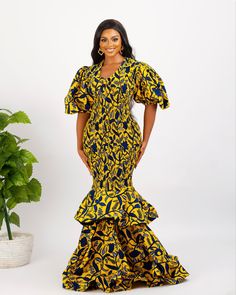 Embrace the bold, embrace the beautiful with this gorgeous Jelani mermaid dress, perfect for a wide range of occasions, including dates, weddings, church, parties, red carpets and more. You can opt for a His & Hers Set to make a stylish statement together. Each piece is meticulously handcrafted using 100% African wax cotton and plain fabric, ensuring the highest quality and authenticity. At our shop, we take pride in creating custom designs tailored just for you. You're welcome to request any customization, whether it's adjusting the length to petite or tall, adding or removing elements from the design, or choosing a different fabric to suit your preferences. To ensure a perfect fit, you can provide us with your measurements if you have them, or simply select your size from our accurate si Fitted Bodice Mermaid Dress, Fishtail Gown For Gala, Fitted Bodice Mermaid Silhouette Evening Dress, Evening Dress With Fitted Bodice And Mermaid Silhouette, Fitted Fishtail Maxi Dress For Wedding, Ruffled Mermaid Dress For Evening, Fishtail Gown With Ruffles For Evening, Evening Fishtail Gown With Ruffles, Fitted Bodice Mermaid Hem Evening Maxi Dress