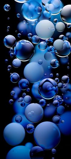 blue and white bubbles floating in the air