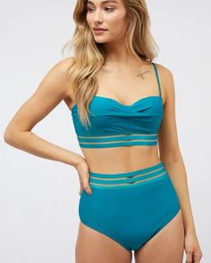 The Solid Two Piece Swimsuit is a classic and versatile swimwear option that combines timeless style with a comfortable fit. With its solid color design, it offers a minimalist yet sophisticated look for the beach or poolside. This two-piece swimsuit provides both ease of movement and a fashionable appearance, making it a dependable choice for enjoying the sun and water with confidence.Bottom's Measurements:Waist: 12.5"Length: 11.5"Model is wearing SmallHeight: 5'9"Bust : 32BWaist : 24"Hips : 34 Solid Swimwear With Built-in Bra For Beach Party, Solid Color Swimwear With Built-in Bra For Beach Party, Solid Color Bra-friendly Swimwear For Pool, Solid Color Underwire Swimwear For Sports, Pool-ready Solid Color Bra-friendly Swimwear, Solid Bra Friendly Swimwear For Pool, Swimwear With Built-in Bra For Beach Party, Solid Underwire Swimwear, Bra Friendly, Solid Bra-friendly Swimwear For Pool