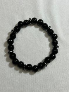 6mm natural black onyx gemstone beaded Black Beaded Bracelets For Gifts, Onyx Crystal Bracelet With Black Round Beads, Adjustable Black Gemstone Beaded Bracelets, Adjustable Obsidian Stretch Bracelet With Round Beads, Adjustable Black Stretch Bracelet, Casual Black Bracelet Jewelry, Adjustable Black Bracelet With Round Beads, Adjustable Black Jewelry With 8mm Beads, Adjustable Black Crystal Bracelet With Black Beads