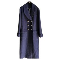 Chanel Wool navy coat. New with tag. 90% wool 10% cashmere 100% silk- lining Size 44. Luxury Navy Peacoat With Button Closure, Luxury Navy Peacoat With Double Button Closure, Designer Wool Peacoat For Work, Luxury Double Button Peacoat For Work, Elegant Navy Peacoat With Double Button Closure, Elegant Navy Pea Coat With Button Closure, Luxury Pea Coat With Double Button Closure, Luxury Office Peacoat With Double Button Closure, Luxury Navy Outerwear With Lapel Collar