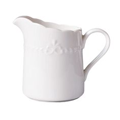 a white porcelain pitcher on a white background