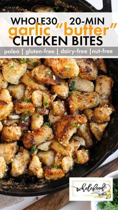 chicken bites in a cast iron skillet with parsley and garlic on the side